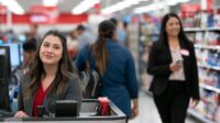 Retail staff working at fixed and mobile positions in a store